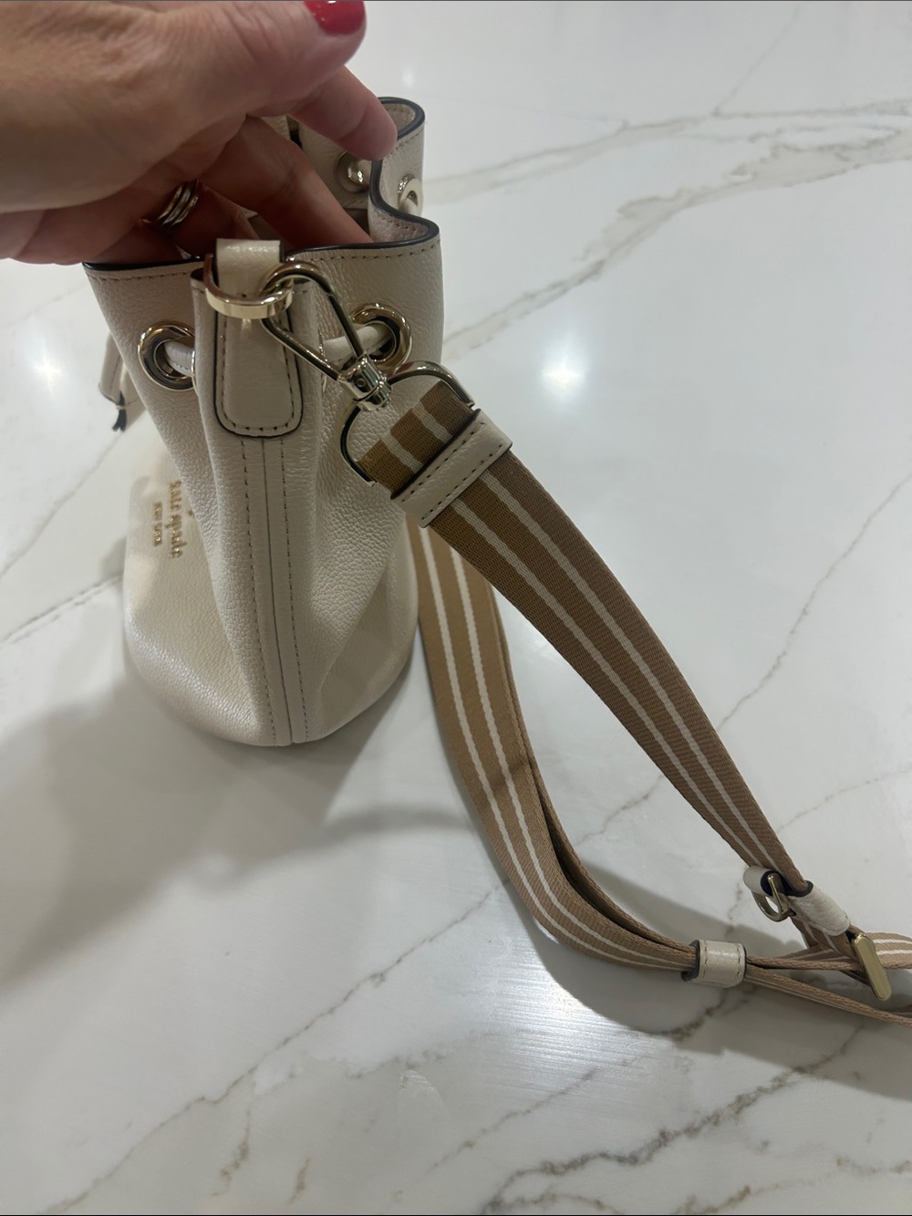 kate spade Cream Pebbled Leather Drawstring Crossbody with Striped Strap - Picture 7 of 7